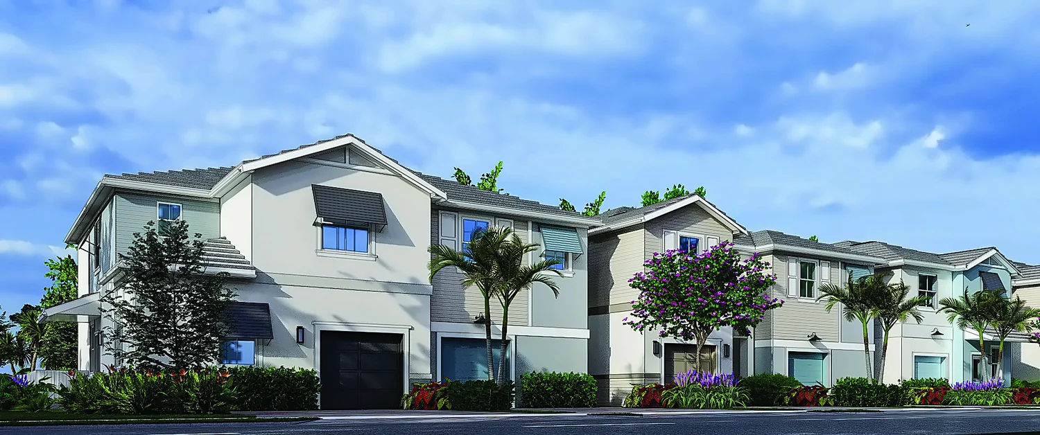 Townhomes at Vintage Oaks with palms and paver driveway